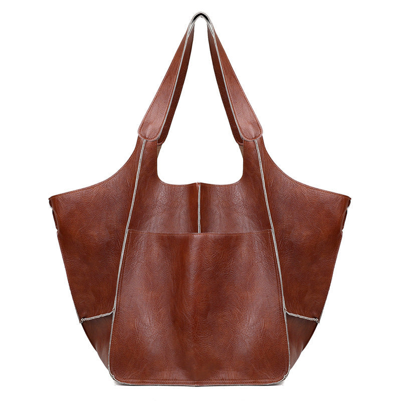 Vexopia - Women’s Oversized PU Leather Weekender Bag with Handles and Shoulder Strap