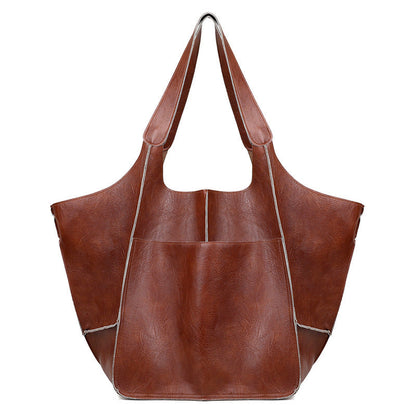 Vexopia - Women’s Oversized PU Leather Weekender Bag with Handles and Shoulder Strap