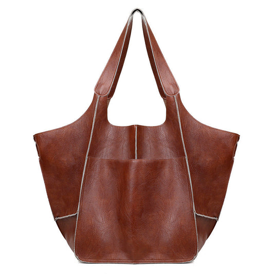 Vexopia - Women’s Oversized PU Leather Weekender Bag with Handles and Shoulder Strap